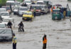 Floods Could Power Nigeria If Only the Government Cared. Flooded Road with vehicles