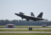 Florida Air Force Base Orders Residents to Remove Early Christmas Decorations, Prompting Backlash and Debate. An F-22 Raptor takes off from Tyndall air force base Florida