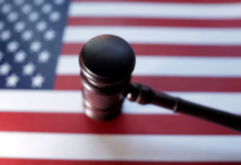 US judge halts end of deportation protections for South Sudanese migrants U.S. flag and Judge gavel