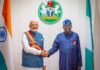 India Courts Africa: Tinubu Invited to 2026 Summit Tinubu with Indian leaders or symbolic handshake imagery representing partnership.