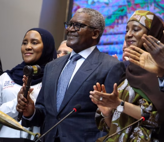 Dangote Refinery Opens Historic 2.15 trillion Naira IPO, Giving Nigerians Chance to Own Part of Energy Giant Aliko Dangote holding the ceremonial gavel during the IPO launch at the Nigerian Exchange in Lagos on Sept. 14, 2026.